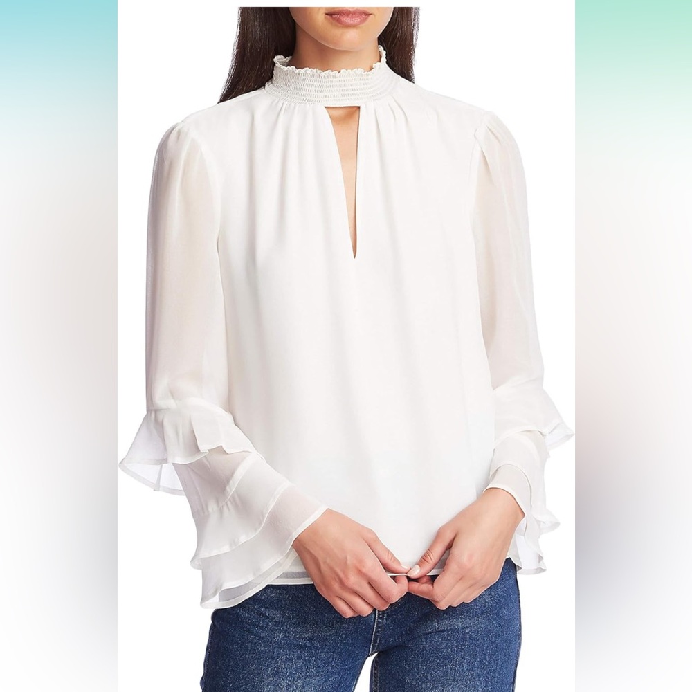 Frilly ruffled long sleeved blouse